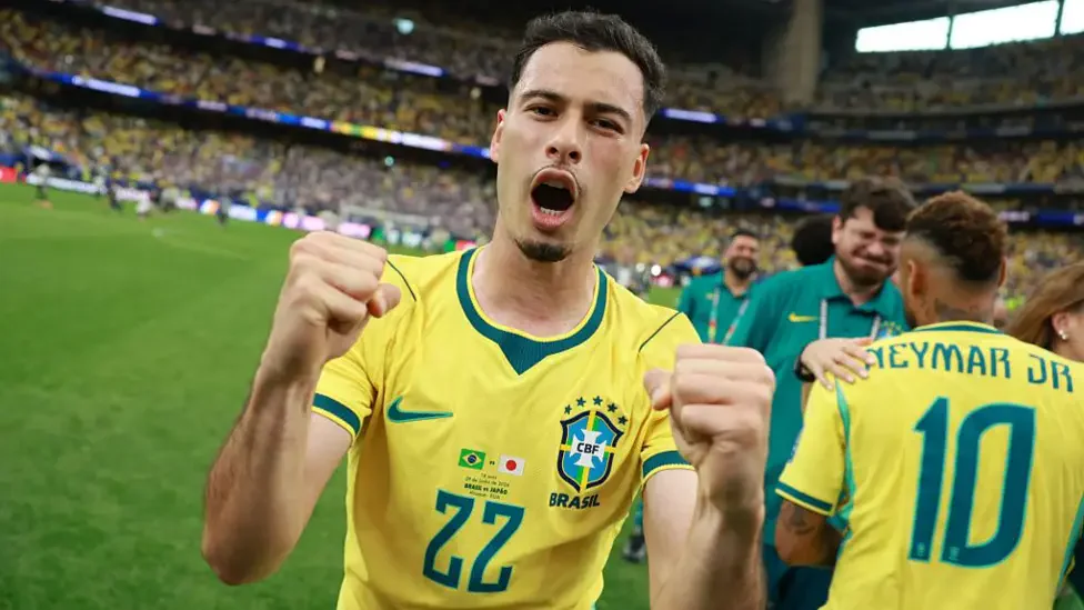 Casemiro celebrates his equalizing goal for Brazil against Japan in the World Cup Round of 32