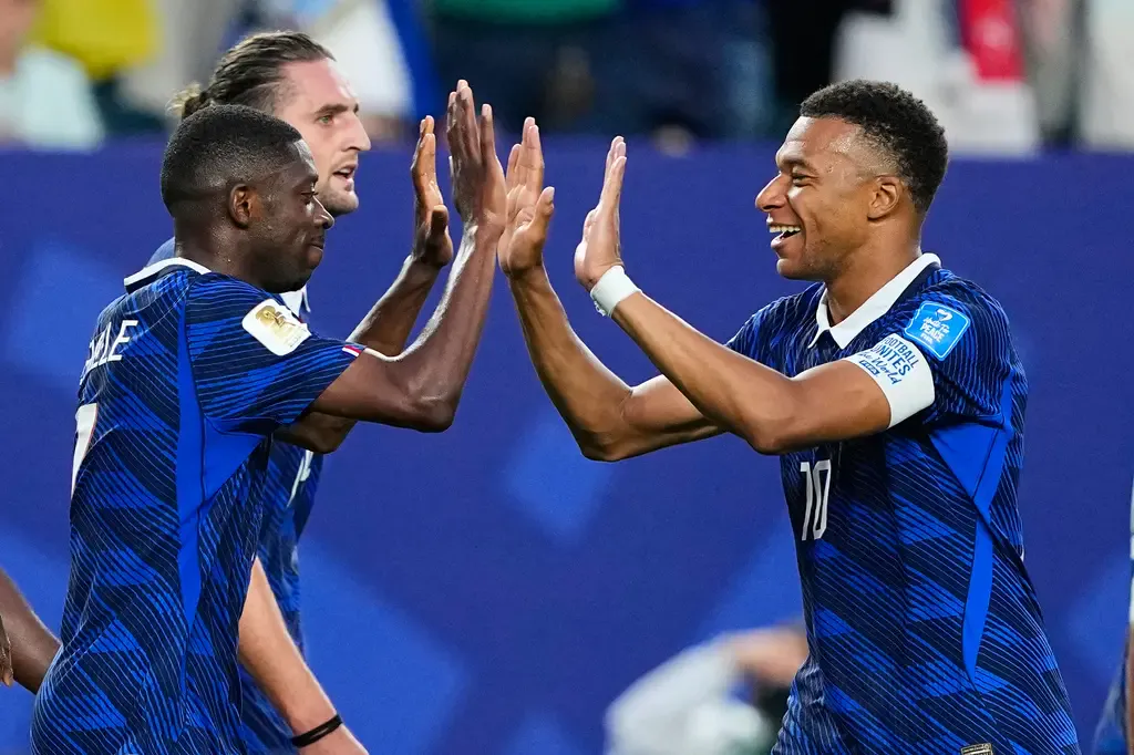 France players celebrate their 3-0 victory over Iraq in Philadelphia
