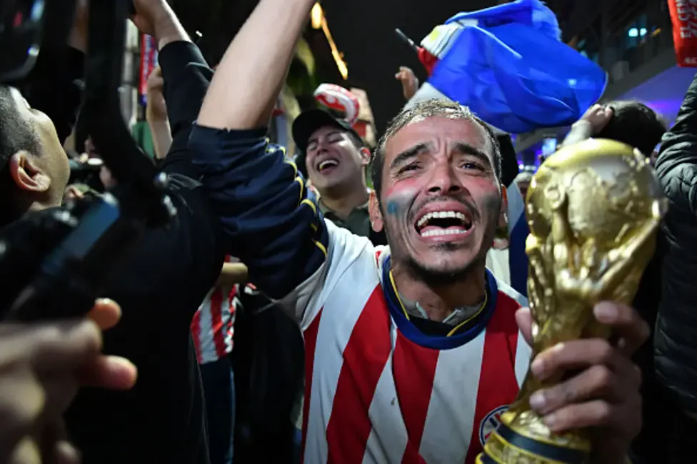 Paraguay's Julio Enciso rises highest to head his team into a shock lead against Germany in the first half