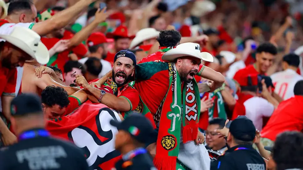 Morocco players celebrate their penalty shootout victory against Netherlands