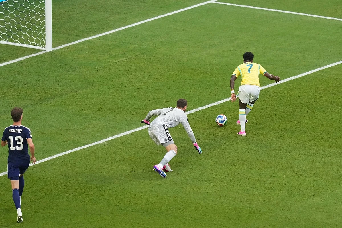 Vinícius Júnior celebrates after scoring for Brazil against Scotland