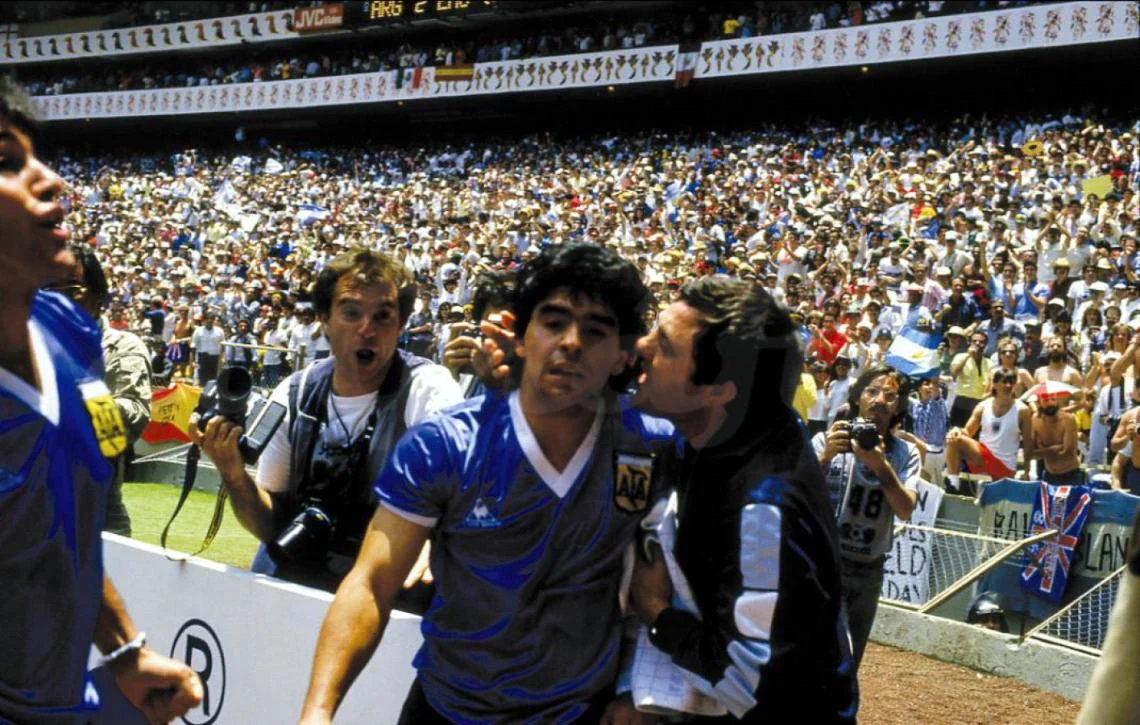 An iconic World Cup goal celebration — Pelé 1970, Maradona 1986, or Messi's record chase in 2026